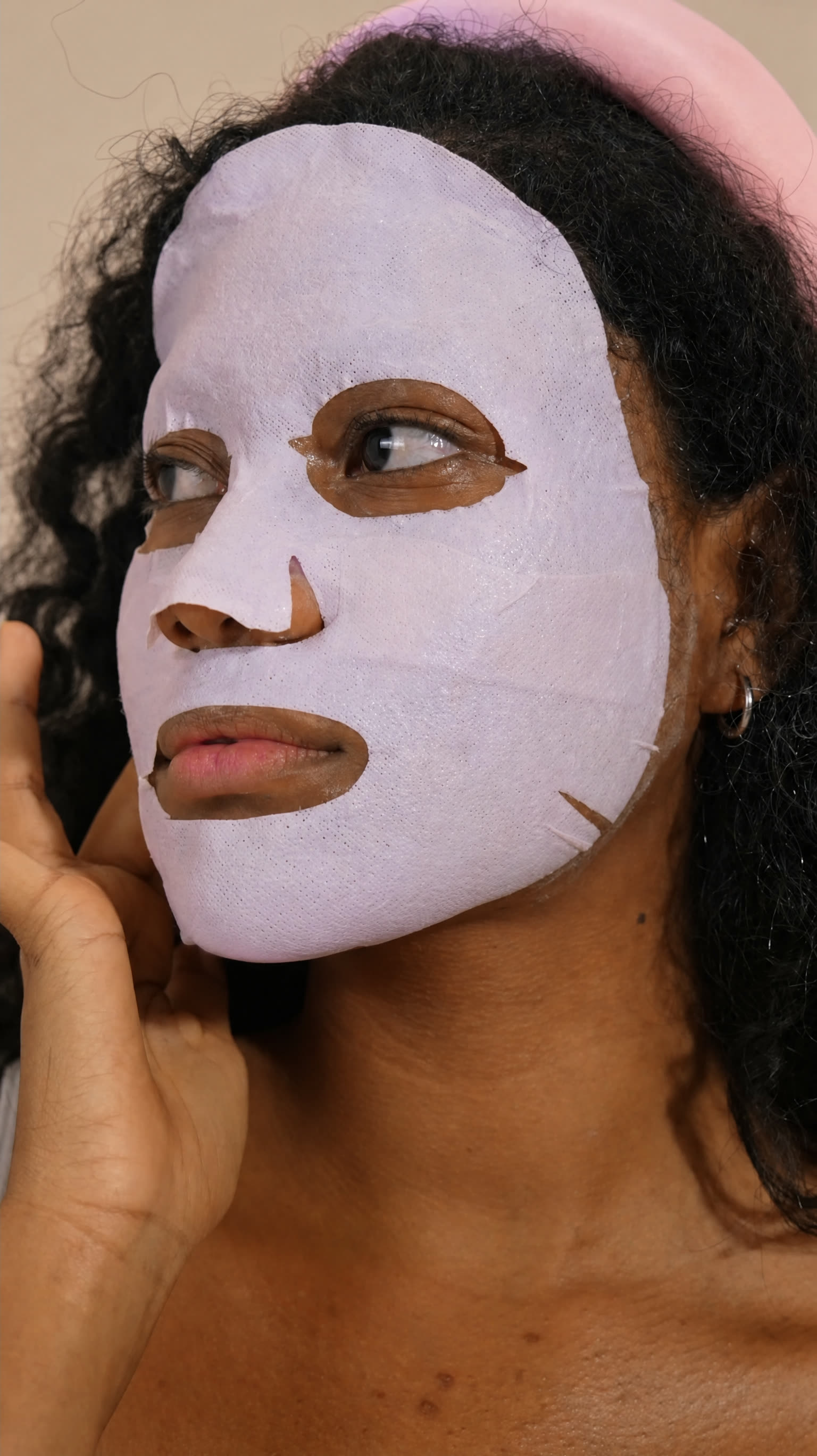 Model wearing the Glacial Purple Clay sheet mask