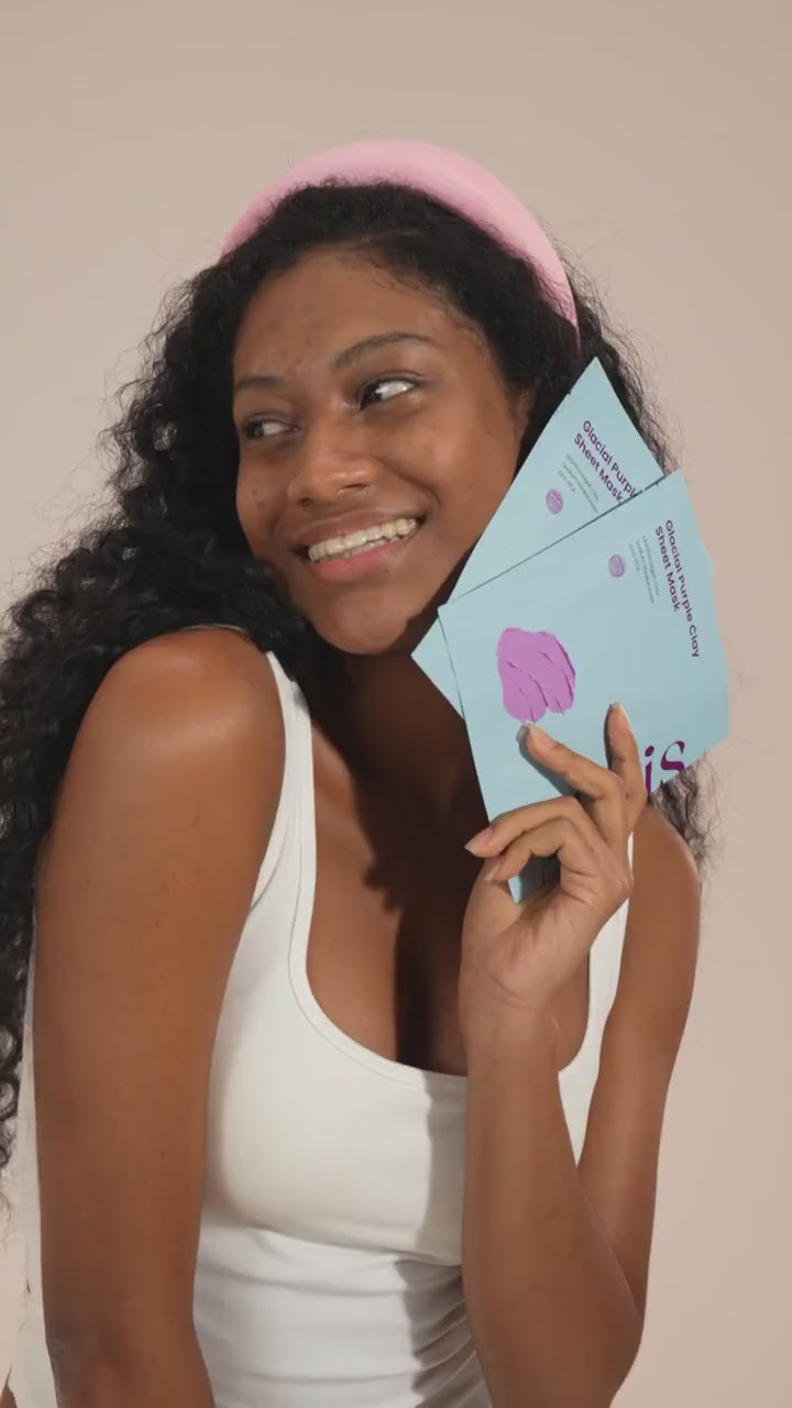 Applying the Glacial Purple Clay Sheet Mask
