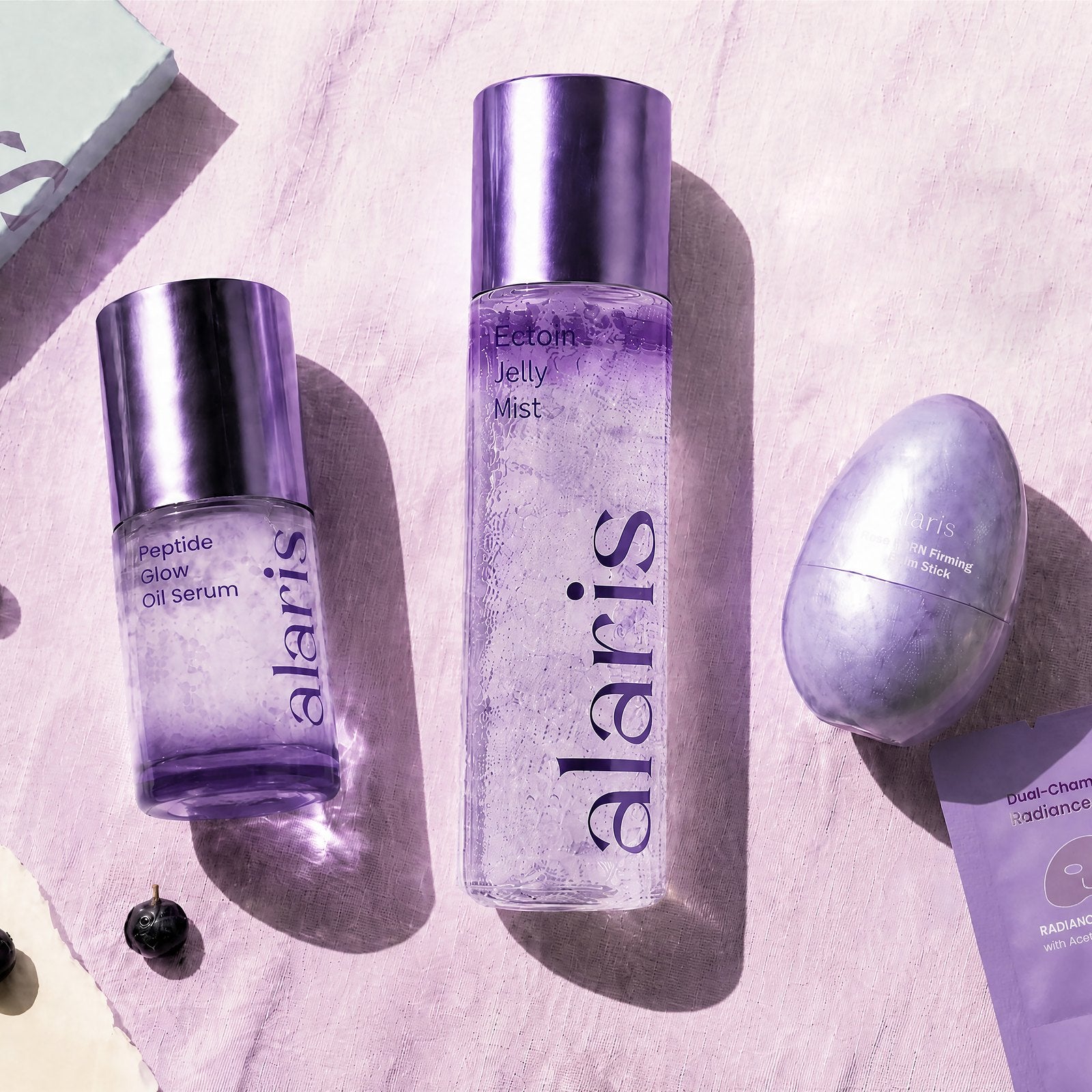 Alaris skincare collection arranged with black goji and lavender